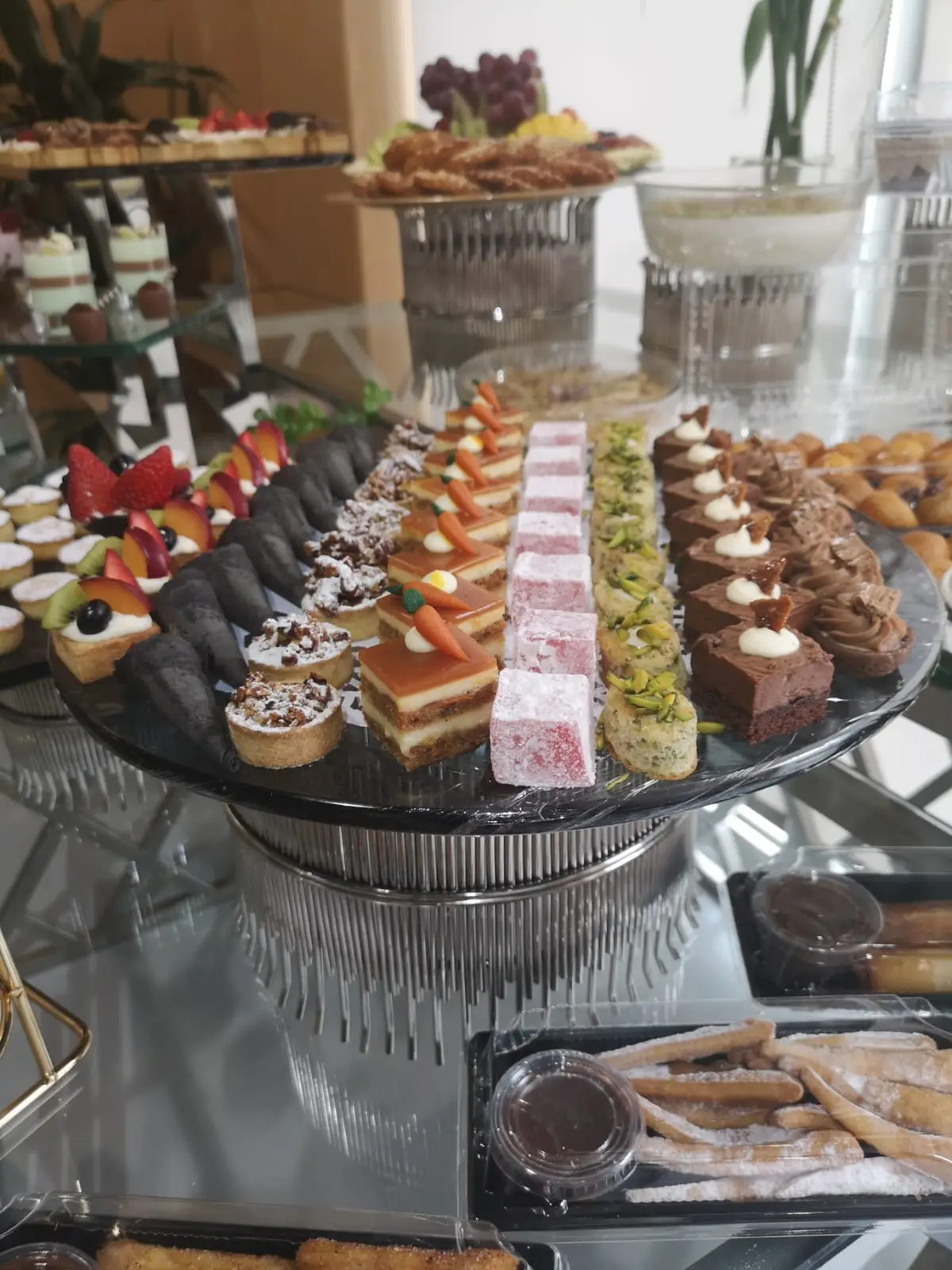 Assorted miniature cakes and desserts