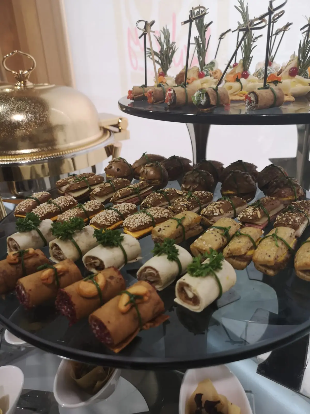 Tiered savoury canapé display prepared by Chef Mier